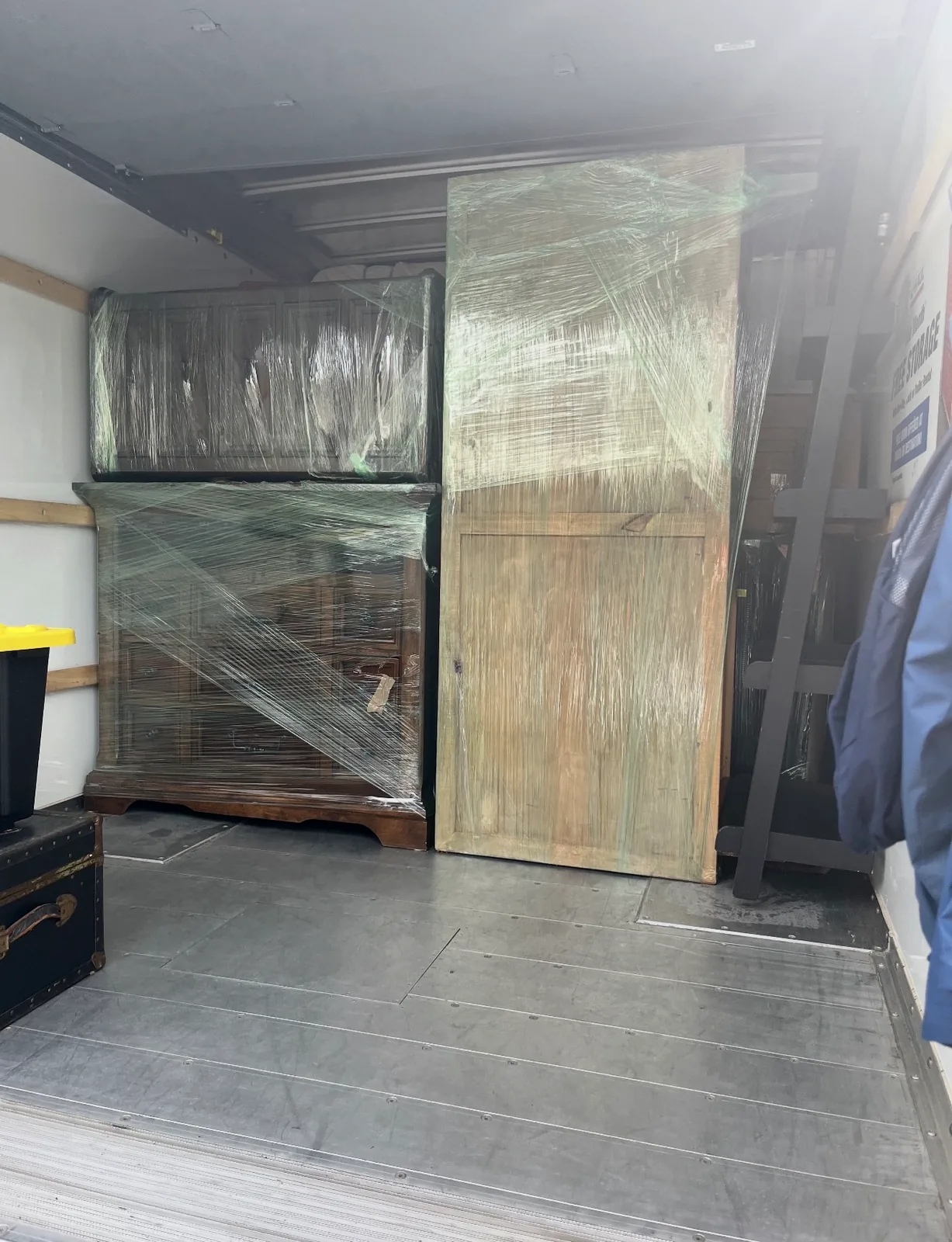 Wrapped and secured furniture